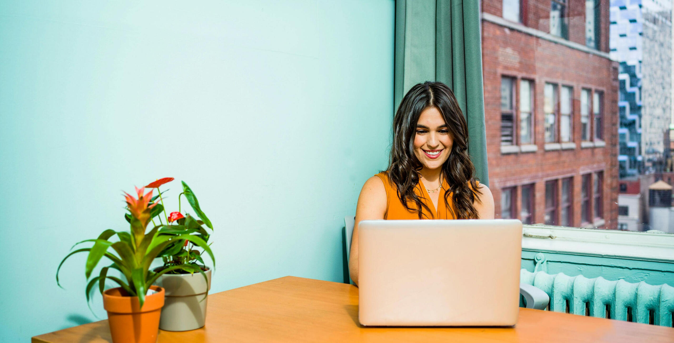 a client looking at their new website on a laptop